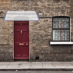 Vchodová strieška 150x75 cm SPRINGOS POLYROOF sivá/transparentná